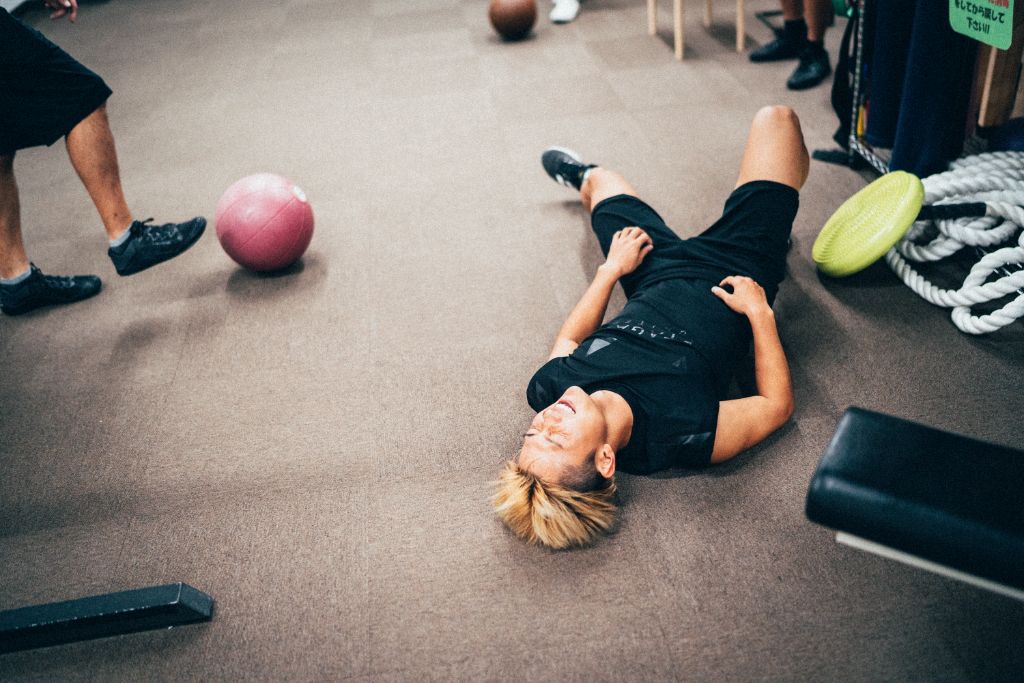 アスリートトレーニング - 休憩時の笑顔